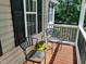 Cozy front porch with seating and decor, creating a welcoming outdoor space at 640 Sagamore Dr, Louisburg, NC 27549