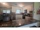 Updated kitchen with stainless steel appliances, ample counter space, and a functional layout for cooking and entertaining at 66 Epsom Rocky Ford Rd, Henderson, NC 27537
