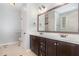 Bathroom featuring double sink vanity, and tiled floors at 71 Potted Plant Ct, Clayton, NC 27520