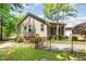 Charming home with lush lawn and mature landscaping at 71 Potted Plant Ct, Clayton, NC 27520