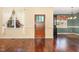 Inviting foyer featuring hardwood floors and a stylish front door at 71 Potted Plant Ct, Clayton, NC 27520