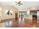 Bright and airy living room with hardwood floors and large windows at 71 Potted Plant Ct, Clayton, NC 27520