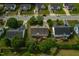 An aerial view shows the layout of this residential neighborhood, with mature trees and well-maintained homes at 7109 Spanglers Spring Way, Raleigh, NC 27610
