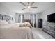 Serene main bedroom with neutral decor, soft lighting, and a large bed with plush bedding at 827 Lockesley Ln, Burlington, NC 27217