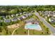 Aerial view of a neighborhood featuring a pool and playground at 912 Beech Glen Dr, Mebane, NC 27302