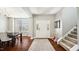 Spacious foyer with hardwood floors, staircase and lots of natural light at 912 Beech Glen Dr, Mebane, NC 27302