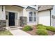 Charming front door with stone accents and lush landscaping for added curb appeal at 912 Beech Glen Dr, Mebane, NC 27302