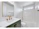 Updated bathroom with stylish fixtures, vanity, and shower-tub combo at 1009 Sarazen Dr, Clayton, NC 27527
