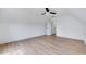 Bright bedroom featuring a ceiling fan and wood-look flooring at 1009 Sarazen Dr, Clayton, NC 27527
