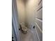 Well-lit powder room featuring marble floors, a standard toilet, and white painted paneled doors at 1010 Westerland Way # 200, Durham, NC 27703