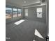 Bright bedroom with three large windows offering ample natural light and neighborhood views at 1010 Westerland Way # 200, Durham, NC 27703