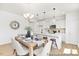 Elegant dining area adjacent to a modern kitchen, featuring stylish furnishings and ample natural light at 103 Mable Ct # 25P, Lillington, NC 27546