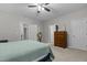 Bedroom featuring a ceiling fan, plush carpet, neutral walls, and natural light at 105 Oak Ridge Rd, Franklinton, NC 27525