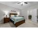 Bedroom featuring a ceiling fan, plush carpet, neutral walls, and natural light at 105 Oak Ridge Rd, Franklinton, NC 27525