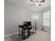 Cozy bedroom with desk area, bright window, and ceiling fan at 105 Oak Ridge Rd, Franklinton, NC 27525