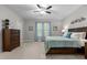 Bedroom featuring a ceiling fan, plush carpet, neutral walls, and natural light at 105 Oak Ridge Rd, Franklinton, NC 27525