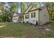 Charming single-Gathering home with a lush lawn, a covered front porch, and an attached garage at 105 Oak Ridge Rd, Franklinton, NC 27525