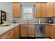 Kitchen features granite counters, stainless steel appliances, and light wood cabinets at 105 Oak Ridge Rd, Franklinton, NC 27525