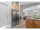 Spacious kitchen with stainless steel refrigerator, light wood cabinets and granite countertop at 105 Oak Ridge Rd, Franklinton, NC 27525