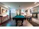 Well lit game room featuring a pool table and other accessories and decor at 117 Hillcrest Rd, Raleigh, NC 27605