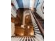 Elegant staircase with dark wood and white trim, providing a classic design element at 117 Hillcrest Rd, Raleigh, NC 27605