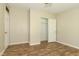 Neutral bedroom offers a ceiling fan, closet, and vinyl wood flooring at 1201 Red Sunset Pl, Siler City, NC 27344