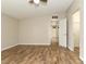 Open Primary bedroom with ceiling fan and adjoining doorways at 1201 Red Sunset Pl, Siler City, NC 27344
