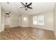 Bright living room with abundant natural light and stylish laminate floors at 1201 Red Sunset Pl, Siler City, NC 27344