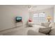 Comfortable bedroom with lots of natural light and a seating area, perfect for relaxation at 1408 Fairmont St, Durham, NC 27713