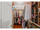Walk-in closet with built-in shelving and organization racks at 1408 Fairmont St, Durham, NC 27713