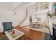 Spacious living room with high ceilings and a staircase, featuring comfortable seating at 1408 Fairmont St, Durham, NC 27713