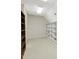 Unfinished attic has a wood floor, exposed wood beams, and insulation in the walls at 1428 Gray Bluff Trl, Chapel Hill, NC 27517