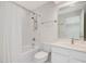 Neat white bathroom with tub/shower combo, toilet, vanity with sink, and a large mirror at 1428 Gray Bluff Trl, Chapel Hill, NC 27517