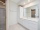 Spacious bathroom with dual vanities, a large mirror, and a glass shower stall at 1428 Gray Bluff Trl, Chapel Hill, NC 27517