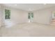 Spacious bedroom with three large windows bringing in natural light at 1428 Gray Bluff Trl, Chapel Hill, NC 27517