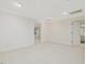 Bright bedroom with white carpet and walls with an ensuite bathroom and walk-in closet at 1428 Gray Bluff Trl, Chapel Hill, NC 27517