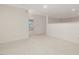 Upstairs bonus room with white walls and carpet plus a partial wall at 1428 Gray Bluff Trl, Chapel Hill, NC 27517