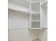 Walk-in closet features built-in shelving and clothing rods at 1428 Gray Bluff Trl, Chapel Hill, NC 27517