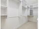 Spacious walk-in closet featuring ample shelving and hanging space for organized storage at 1428 Gray Bluff Trl, Chapel Hill, NC 27517