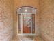 Open foyer featuring beautiful hardwood floors and a glimpse of the staircase at 1428 Gray Bluff Trl, Chapel Hill, NC 27517