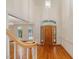 Elegant foyer with wood floors, chandelier, and arched windows create a grand entrance at 1428 Gray Bluff Trl, Chapel Hill, NC 27517