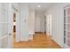 Entryway with hardwood floors and white trim, offering natural light at 1428 Gray Bluff Trl, Chapel Hill, NC 27517