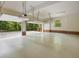 Bright, expansive garage with a modern opener, ample storage, and attached brick trim at 1428 Gray Bluff Trl, Chapel Hill, NC 27517