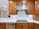 Gourmet kitchen featuring stainless steel appliances, custom cabinetry, and a smooth cooktop at 1428 Gray Bluff Trl, Chapel Hill, NC 27517