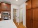 Well-appointed kitchen with stainless steel appliances, and hardwood floors at 1428 Gray Bluff Trl, Chapel Hill, NC 27517