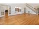 Spacious living area showcasing hardwood floors and staircase access at 1428 Gray Bluff Trl, Chapel Hill, NC 27517