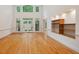 Spacious living room with hardwood floors, recessed shelves and lots of natural light at 1428 Gray Bluff Trl, Chapel Hill, NC 27517