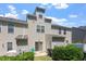Exterior view of the home showcasing a patio, sliding door, and neutral siding at 1710 Grace Point Rd, Morrisville, NC 27560
