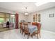 Inviting dining room with seating for six and natural light through sliding glass doors at 220 Cardinal Dr, Youngsville, NC 27596
