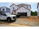 Image of an unfinished two-story home with a Tyvek wrap at 2230 Cherry Creek Rd, Haw River, NC 27258